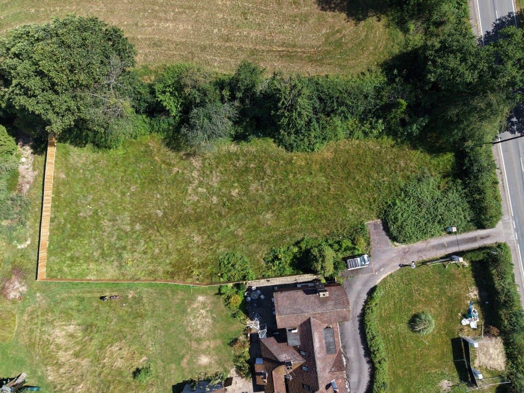 Lot: 53 - BUILDING PLOT WITH PLANNING FOR FOUR DWELLINGS - Hollytree plot from drone 3